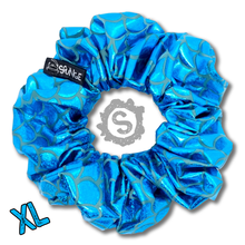 Load image into Gallery viewer, An extra large blue scrunchie, covered in metallic blue scales. Approximately 15cm in Diameter.