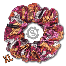 Load image into Gallery viewer, An extra large colourful scrunchie. A rose pattern in the colours of the Lesbian pride flag. White, orange and pink. Approximately 15cm in Diameter.
