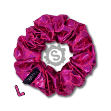 Load image into Gallery viewer, A large hot pink scrunchie, covered in metallic pink scales. Approximately 12cm in Diameter.
